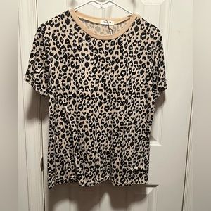 Cheetah print short sleeve t-shirt. In great condition. Only warn a few times.